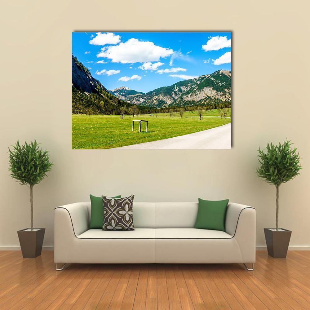 Karwendel Mountains Summer Landscape Canvas Wall Art in white, green and blue, single panel hung on a wall