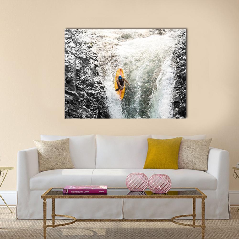 Kayaker Surging Through Tumbling Water Canvas Wall Art in black, white and gray, single panel hung on a wall