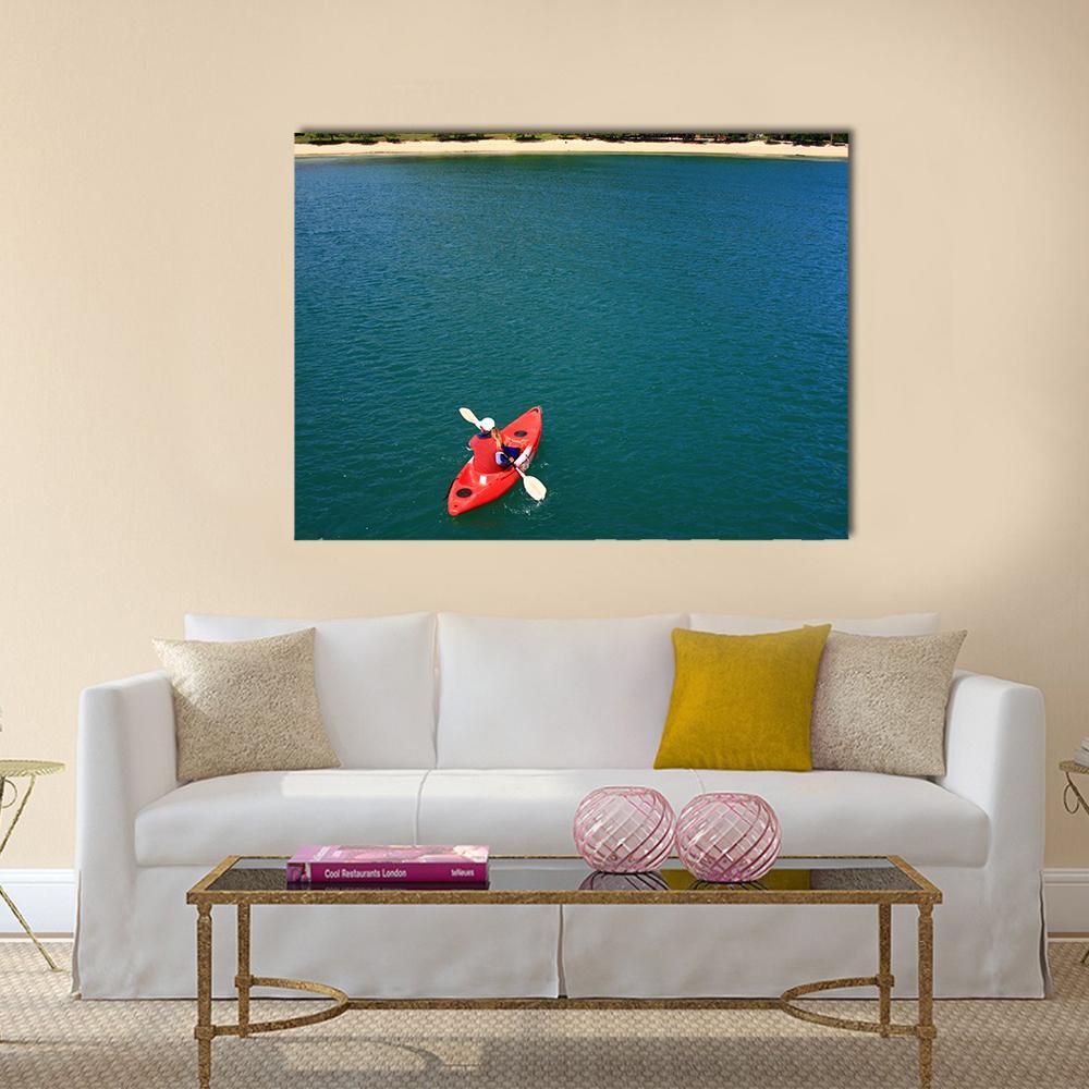 Red Kayak at Ang Thong Canvas Wall Art in red and blue, single panel hung on a wall