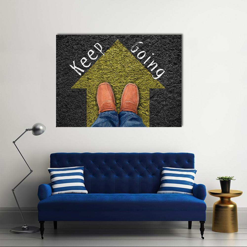 Keep Going Inspirational Quote Canvas Wall Art in black, brown and yellow, single panel hung on a wall