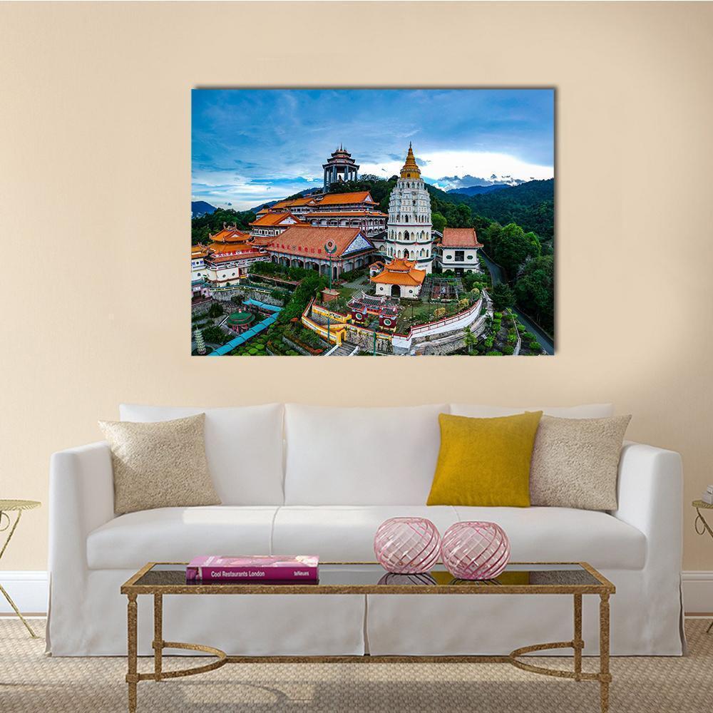 Kek Lok Si Temple Hilltop View Canvas Wall Art in orange, green and blue, single panel hung on a wall
