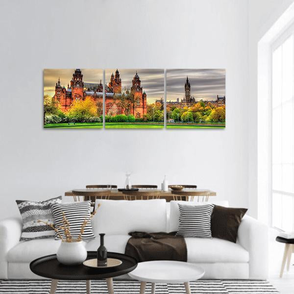Kelvingrove Museum Autumn Park View Panoramic Canvas Wall Art in brown, orange and green, hung on a wall