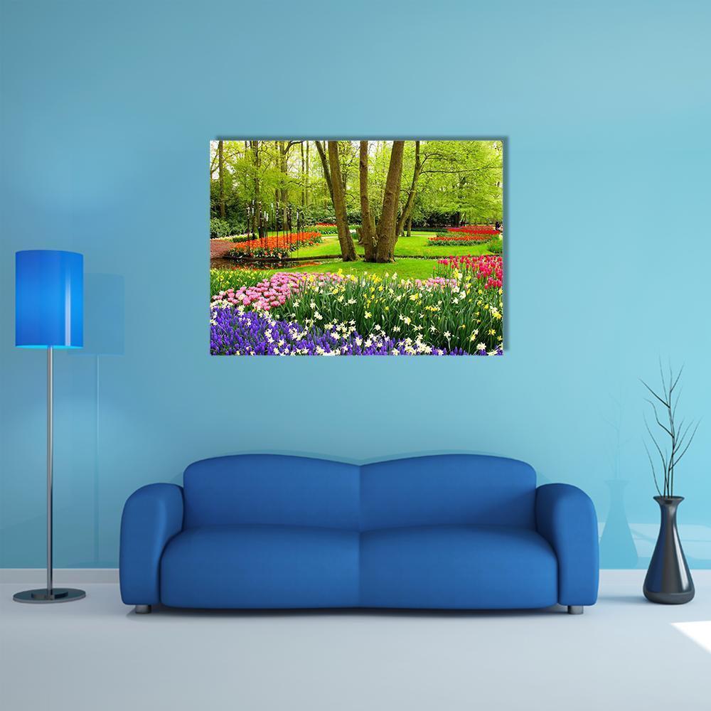 Keukenhof Garden Tulip Beds Canvas Wall Art in green, purple and multicolor, single panel hung on a wall