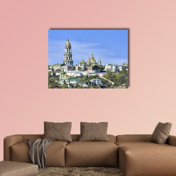 Kiev Pechersk Lavra Monastery with Golden Domes Canvas Wall Art in gold, green and blue, single panel hung on a wall