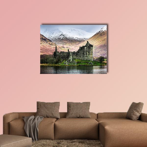 Kilchurn Castle in Winter Canvas Wall Art in white, gray and brown, single panel hung on a wall