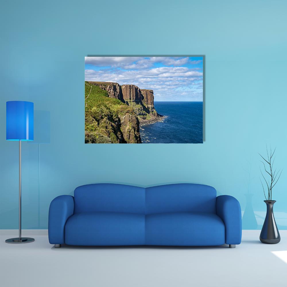 Kilt Rock and Mealt Falls Canvas Wall Art in brown, green and blue, single panel hung on a wall