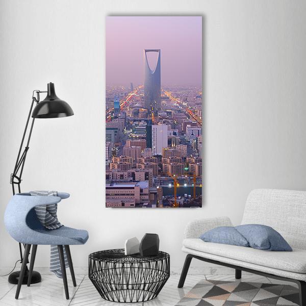 Kingdom Tower in Riyadh Vertical Canvas Wall Art in gray, purple and pink, single vertical panel hung on a wall