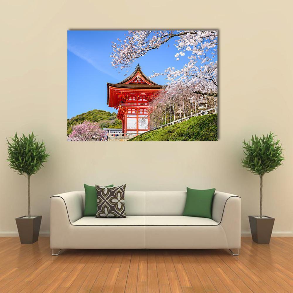 Kiyomizu Dera Temple in Spring Canvas Wall Art in red, blue and pink, single panel hung on a wall