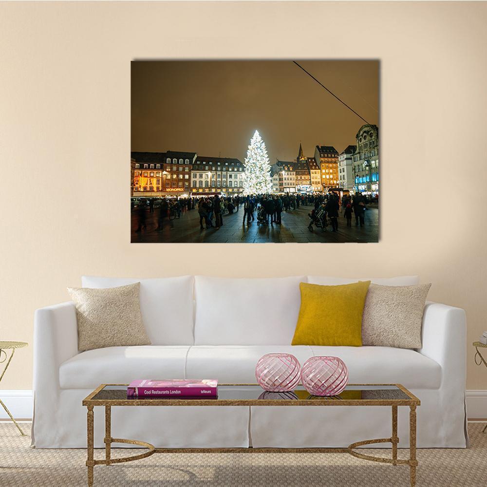 Kleber Square Christmas Night Canvas Wall Art in black, brown and yellow, single panel hung on a wall