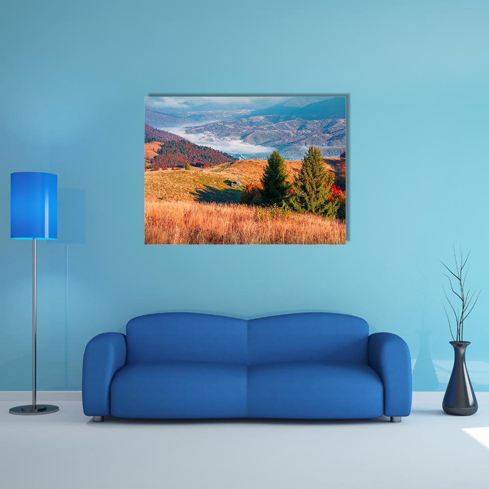 Kolochava Village in Autumn Canvas Wall Art in orange, green and blue, single panel hung on a wall