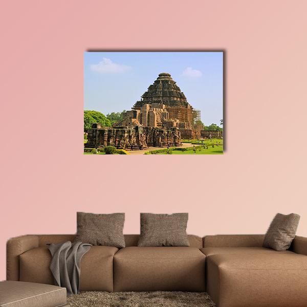 Konark Sun Temple Canvas Wall Art in brown, green and blue, single panel hung on a wall