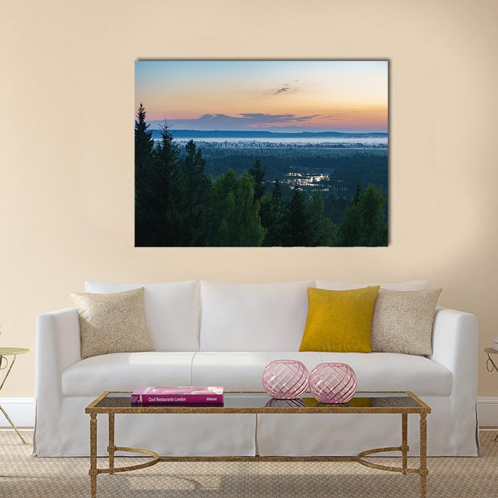 Konnu Suursoo Bog Misty Sunset Canvas Wall Art in orange, green and blue, single panel hung on a wall