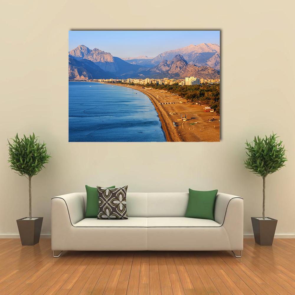 Konyaalti Sand Beach Canvas Wall Art in beige, brown and blue, single panel hung on a wall