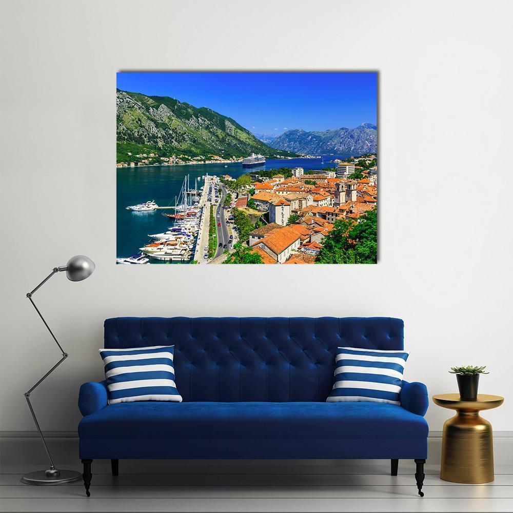 Kotor Bay and Old Town Canvas Wall Art in orange, green and blue, single panel hung on a wall