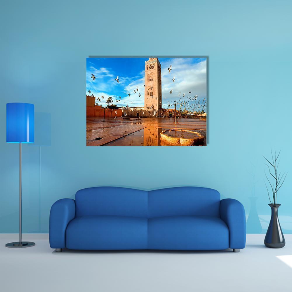 Koutoubia Mosque, Morocco Canvas Wall Art in brown, orange and blue, single panel hung on a wall