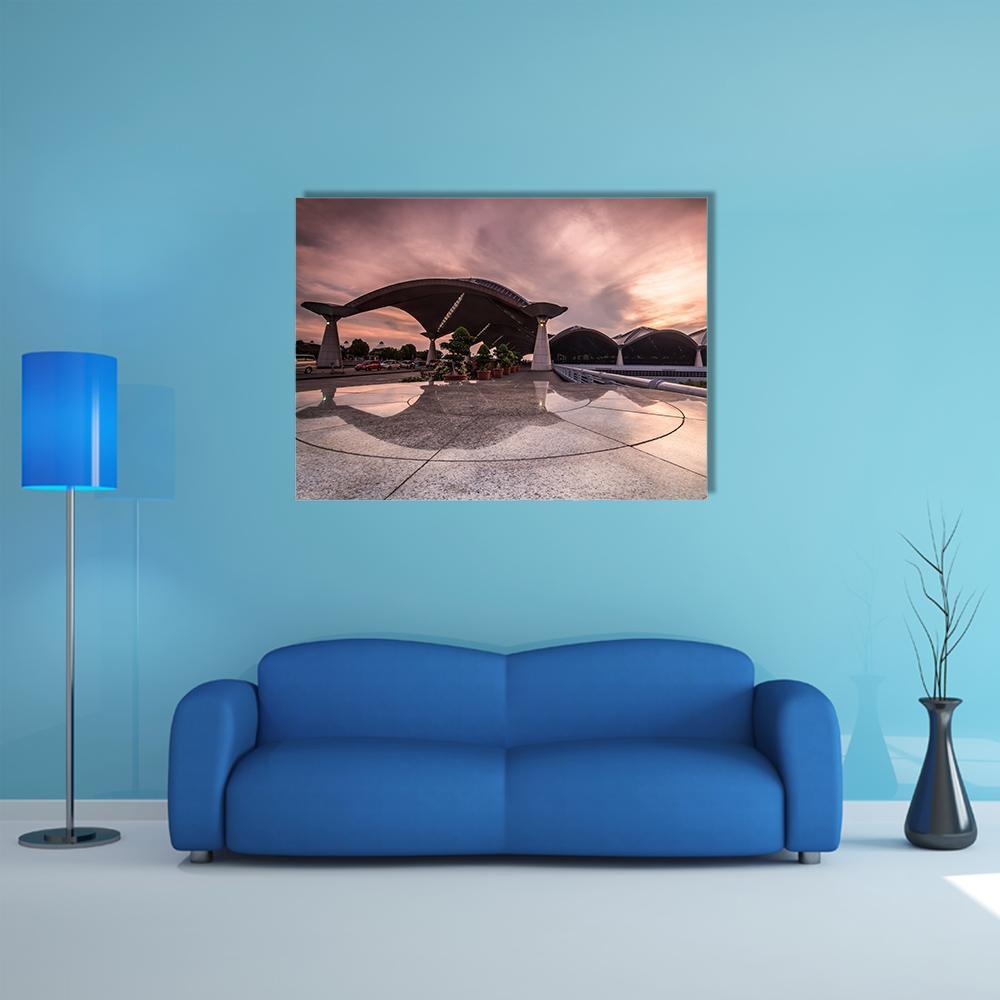 Kuala Lumpur International Airport at Sunset Canvas Wall Art in gray, orange and pink, single panel hung on a wall