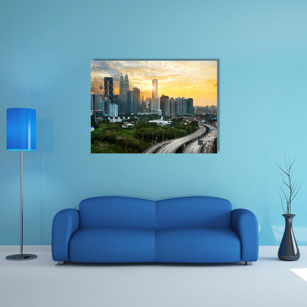 Kuala Lumpur Skyline at Sunset Canvas Wall Art in gray, orange and yellow, single panel hung on a wall