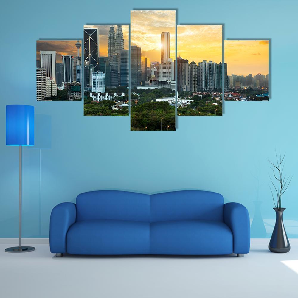 Kuala Lumpur Skyline at Sunset Canvas Wall Art in gray, orange and yellow, 5 panel Star layout hung on a wall