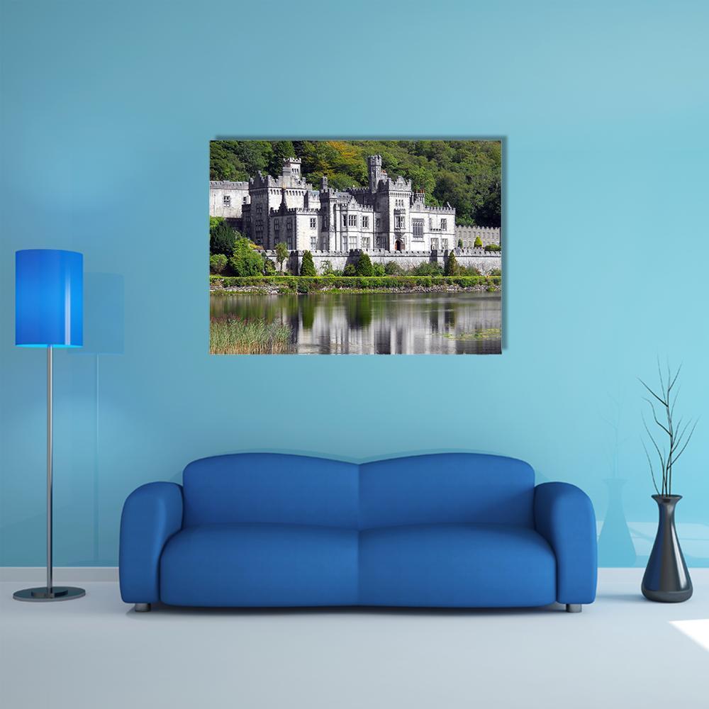 Kylemore Abbey Reflected in Lake Canvas Wall Art in gray and green, single panel hung on a wall