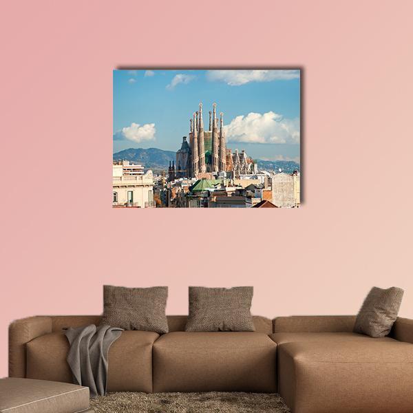 La Sagrada Familia Basilica Canvas Wall Art in beige, brown and blue, single panel hung on a wall