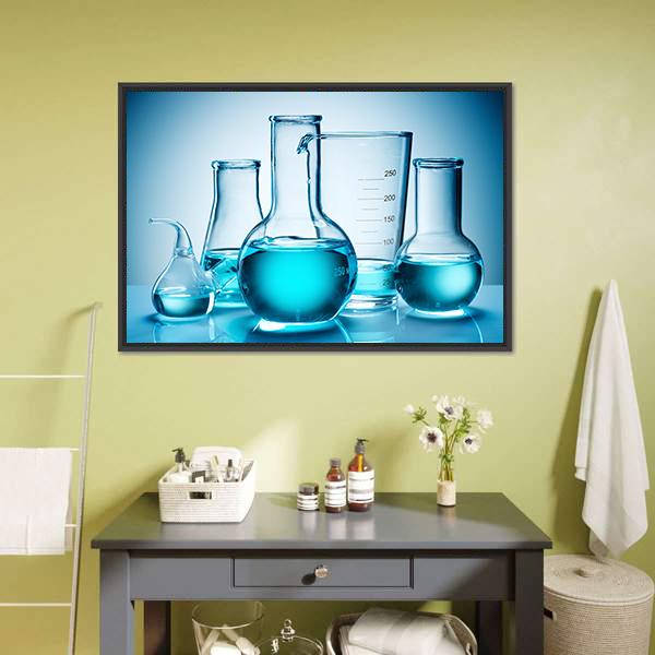 Laboratory Glassware with Blue Liquid Canvas Wall Art in white and blue, framed canvas, product view on a white background