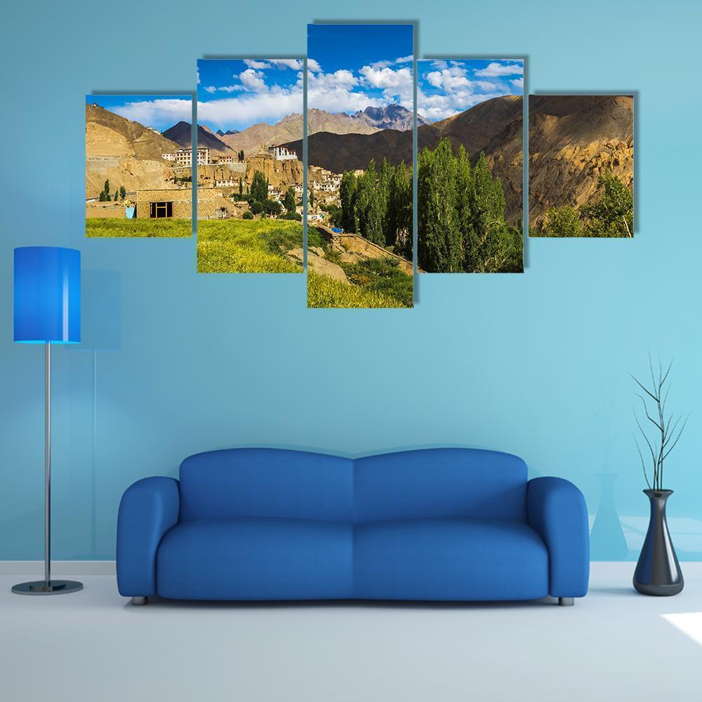 Ladakh Village Road with Green Fields Canvas Wall Art in brown, green and blue, 5 panel Star layout hung on a wall
