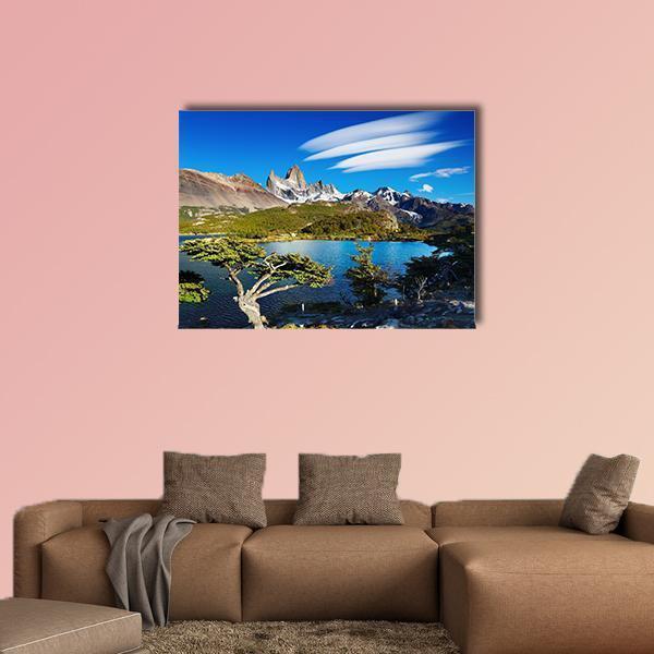 Laguna Capri with Mount Fitz Roy Canvas Wall Art in brown, green and blue, single panel hung on a wall