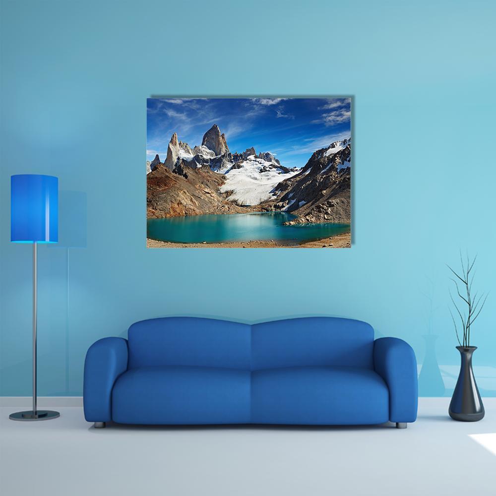 Laguna De Los Tres Mountain Lake Canvas Wall Art in white, brown and blue, single panel hung on a wall