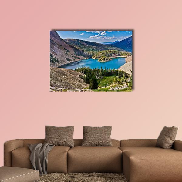 Lake Agnes in Colorado Canvas Wall Art in brown, green and blue, single panel hung on a wall