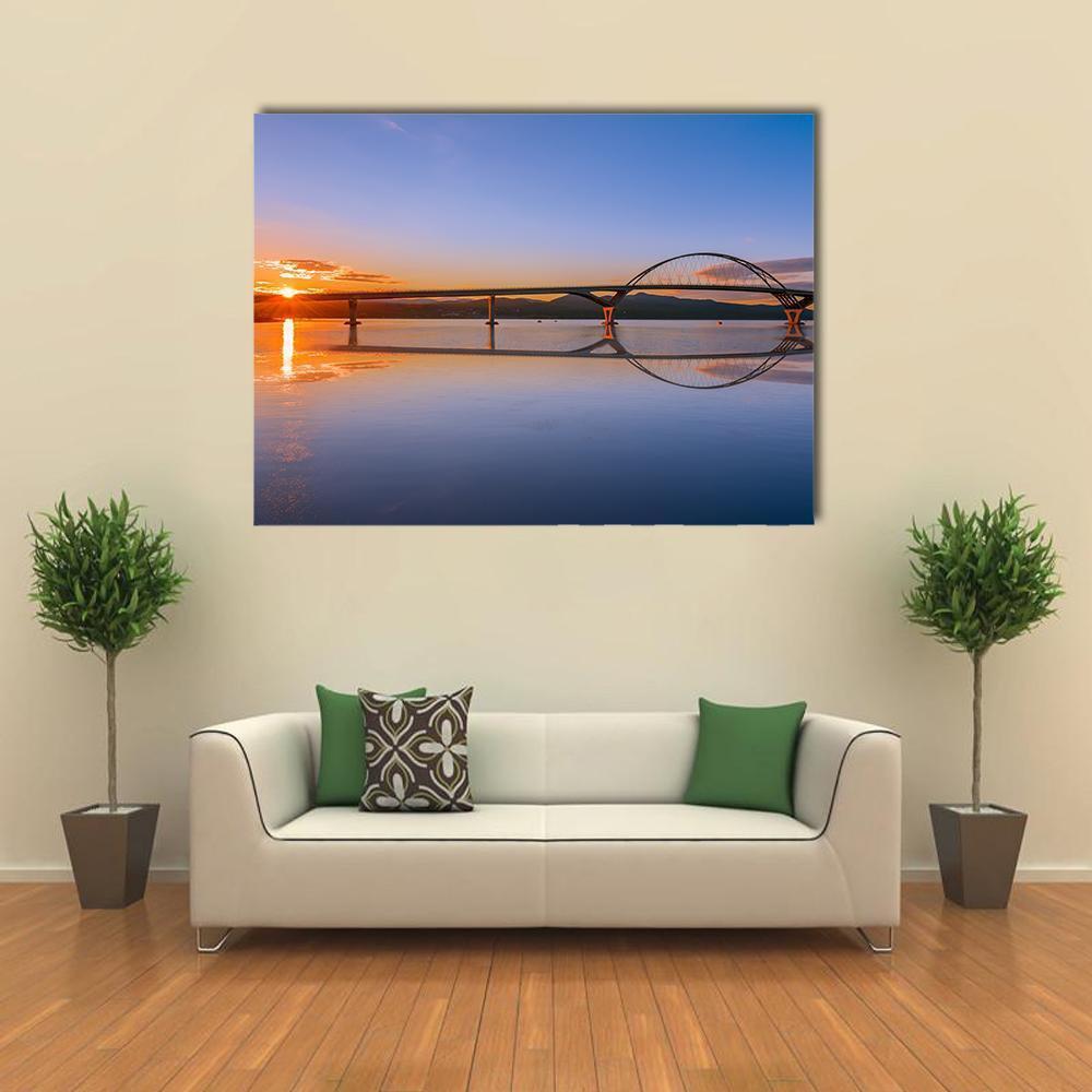 Lake Champlain Bridge at Sunset Canvas Wall Art in orange and blue, single panel hung on a wall
