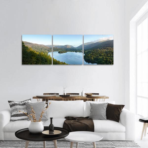 Lake District Vista Panoramic Canvas Wall Art in green and blue, hung on a wall