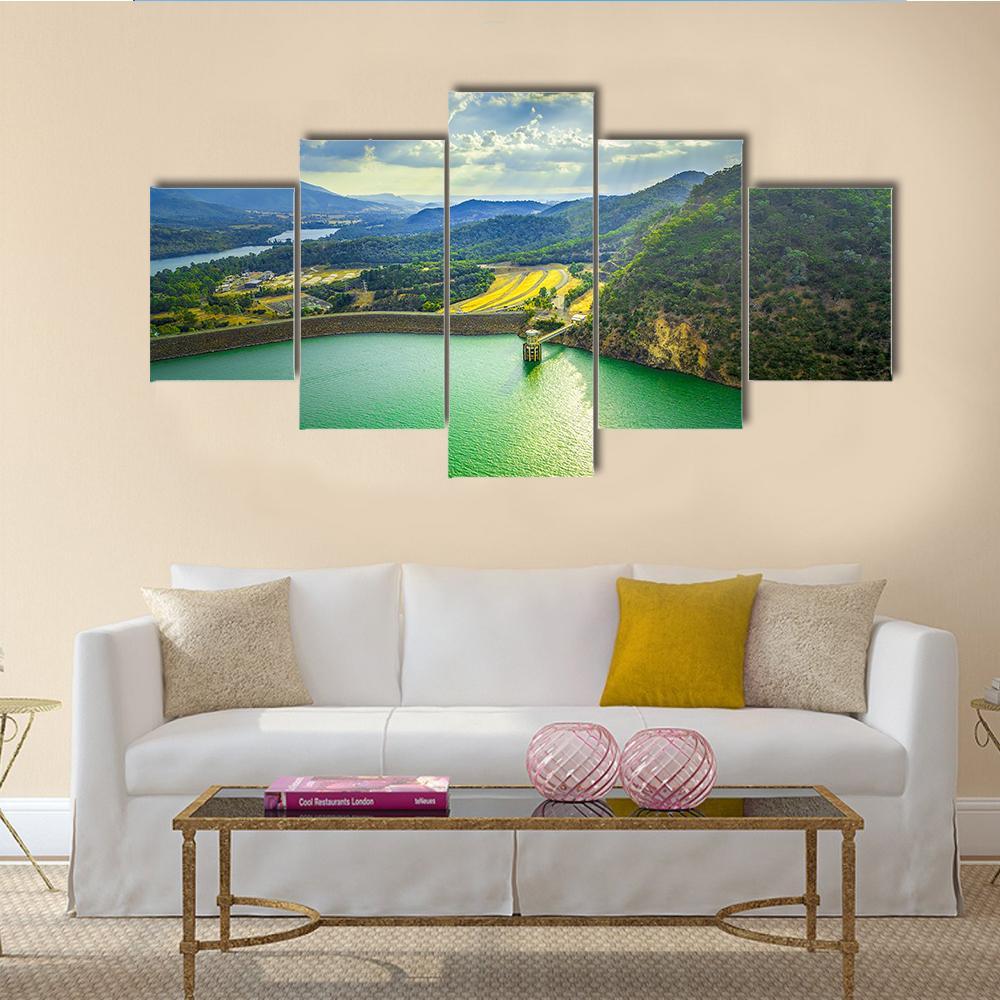 Lake Eildon at Sunset Canvas Wall Art in yellow, green and blue, 5 panel Star layout hung on a wall