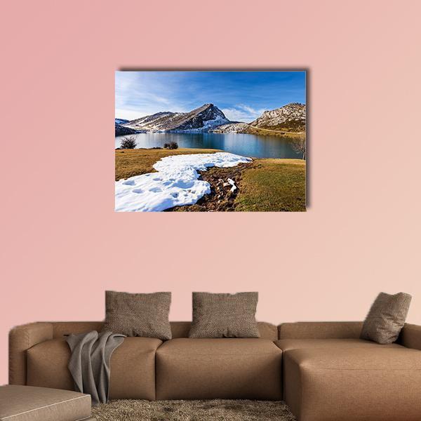 Lake Enol in Winter Canvas Wall Art in white, brown and blue, single panel hung on a wall