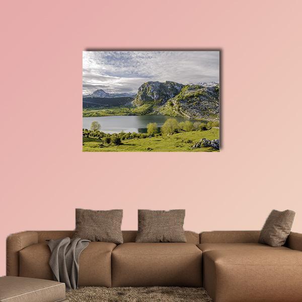 Lake Enol Canvas Wall Art in gray, green and blue, single panel hung on a wall