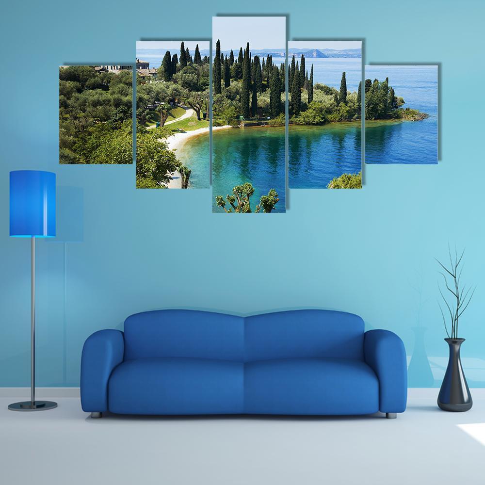 Lake Garda Italy Canvas Wall Art in green and blue, 5 panel Star layout hung on a wall