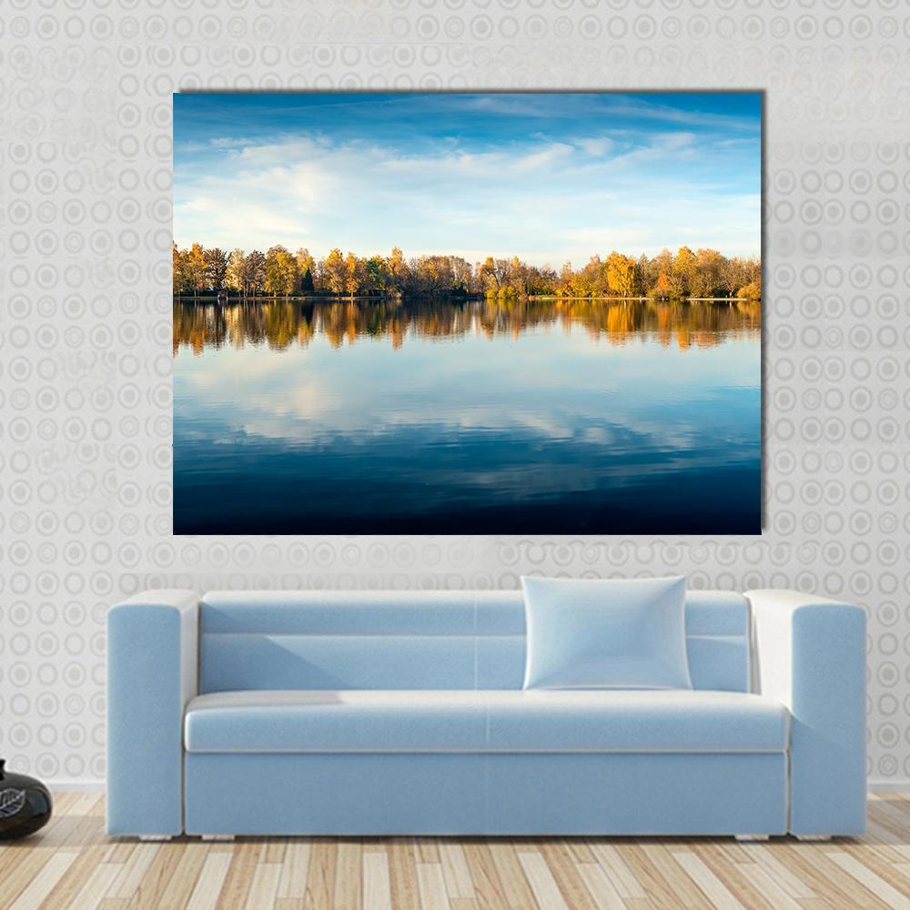 Lake in Autumn Bavaria Canvas Wall Art in orange, yellow and blue, single panel hung on a wall