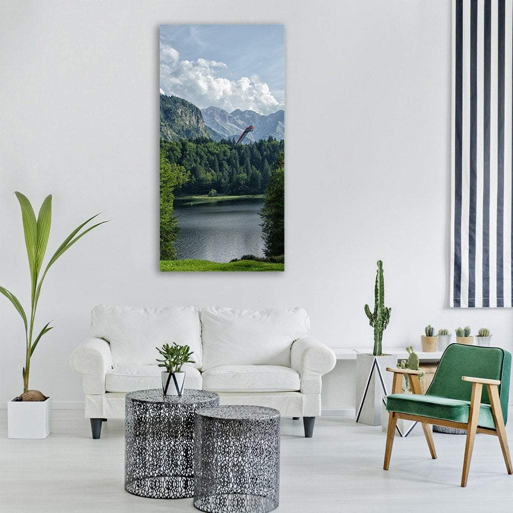 Red Ski Jump at Alpine Lake Vertical Canvas Wall Art in gray, green and blue, single vertical panel hung on a wall
