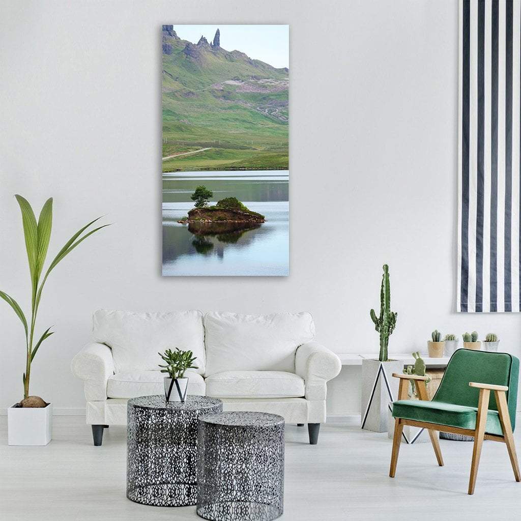 Lake in Scotland Vertical Canvas Wall Art in gray, green and blue, single vertical panel hung on a wall