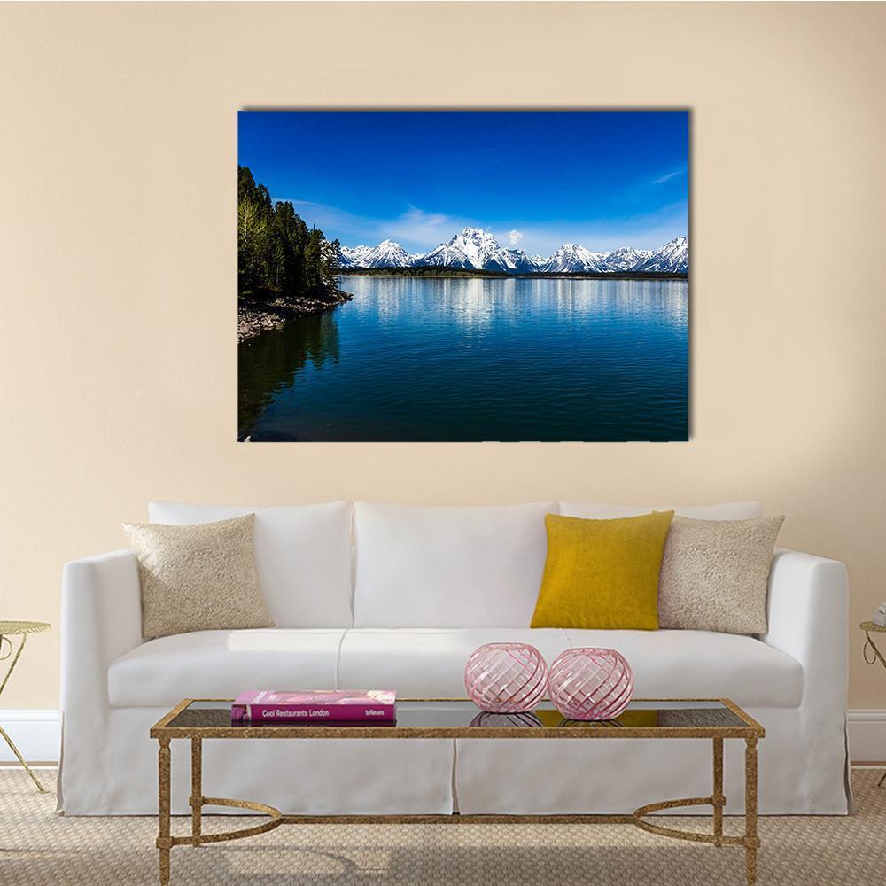 Lake Jackson Reflections Canvas Wall Art in white, green and blue, single panel hung on a wall