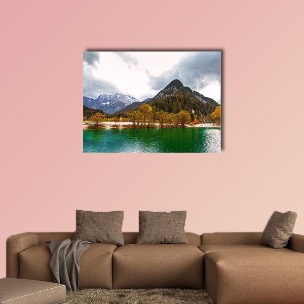 Lake Jasna, Slovenia Turquoise Lake with Autumn Shoreline Canvas Wall Art in brown, green and blue, single panel hung on a wall