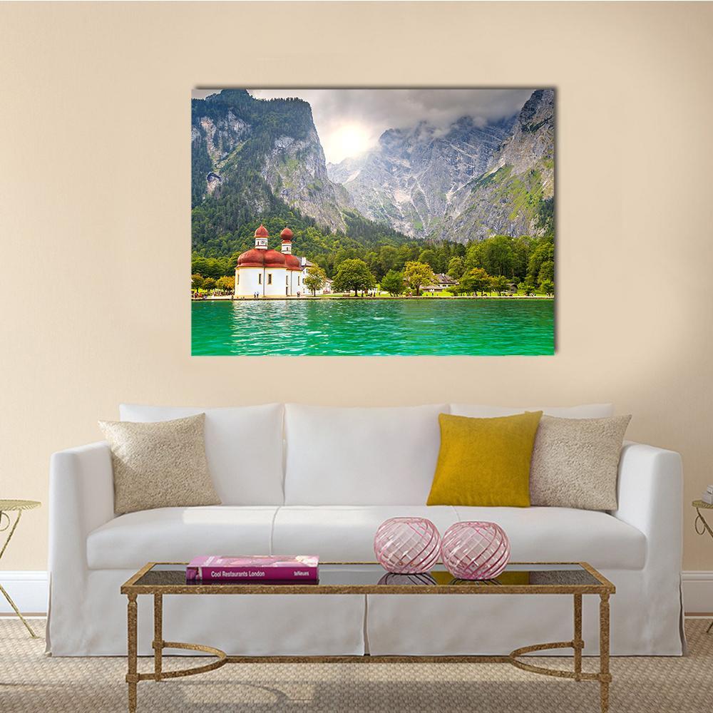 Lake Konigssee with Red Onion-domed Church Canvas Wall Art in gray, green and blue, single panel hung on a wall
