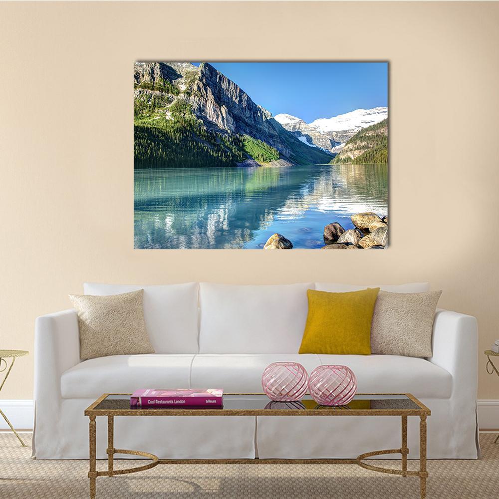 Lake Louise Mountain Reflections Canvas Wall Art in gray, green and blue, single panel hung on a wall