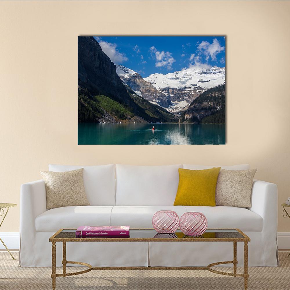 Lake Louise in Summer Canvas Wall Art in white, green and blue, single panel hung on a wall