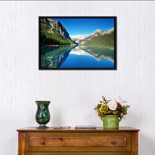 Mountain Lake Reflection with Red Boats Canvas Wall Art in green and blue, framed canvas, product view on a white background