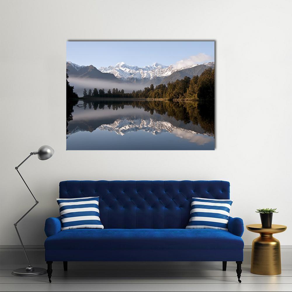 Lake Matheson Morning Reflection Canvas Wall Art in white, brown and blue, single panel hung on a wall