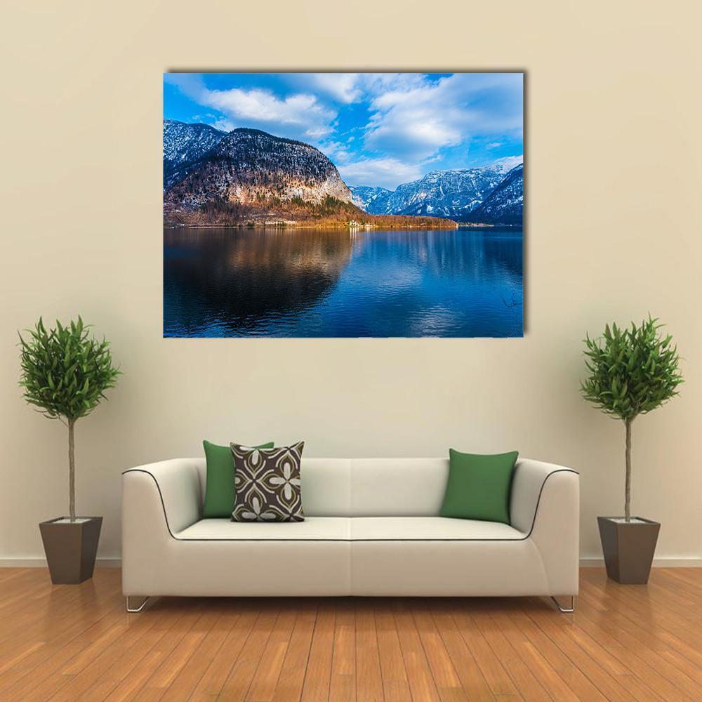Austrian Lake with Snow-capped Mountains Canvas Wall Art in white, brown and blue, single panel hung on a wall