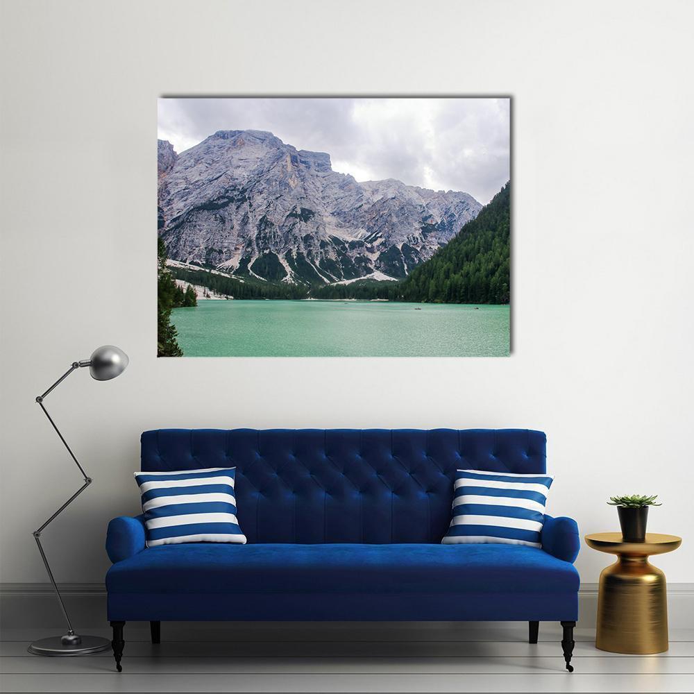 Lake of Braies Mountain Lake Scene Canvas Wall Art in white, gray and green, single panel hung on a wall