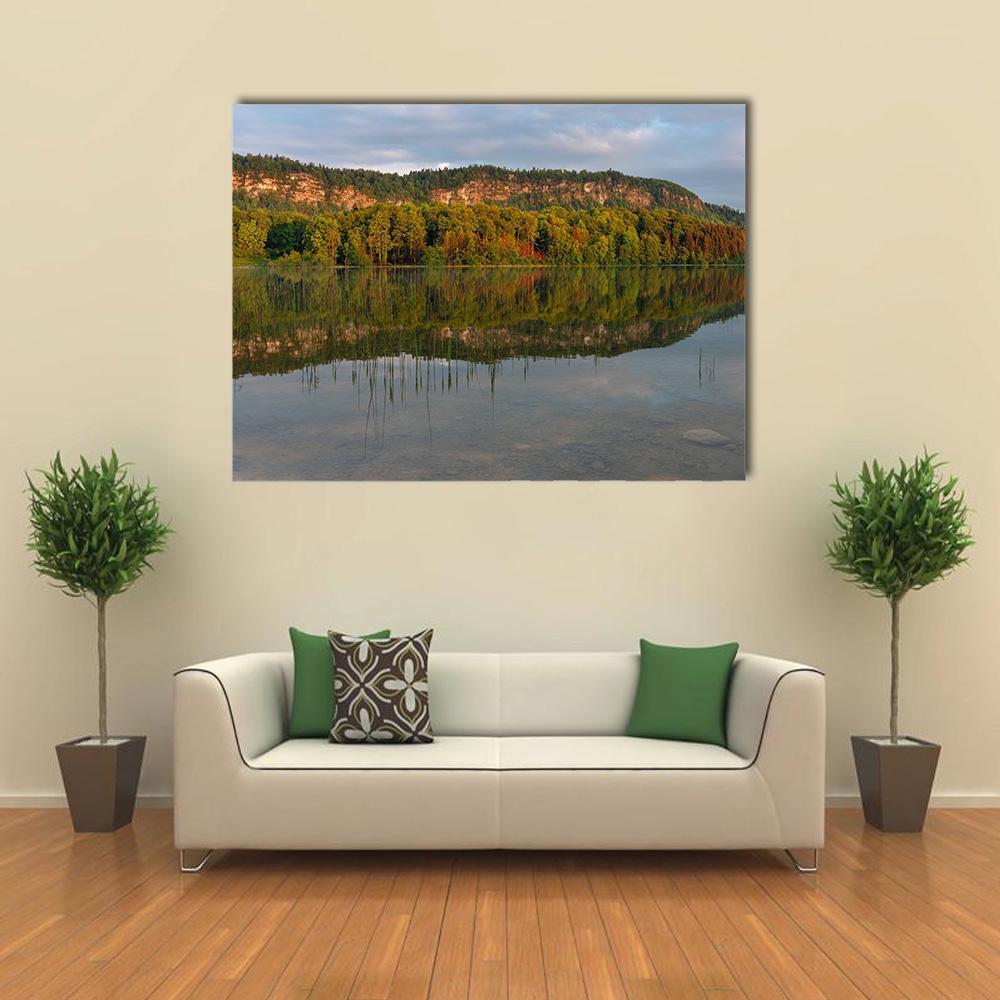 Lake of Ilay Canvas Wall Art in brown, green and blue, single panel hung on a wall