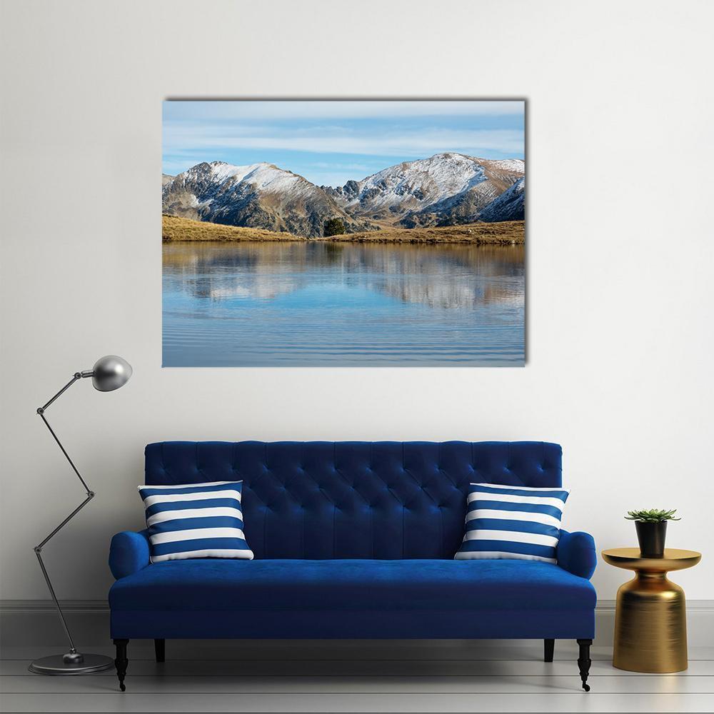 Lake Querol in Winter Canvas Wall Art in white, brown and blue, single panel hung on a wall