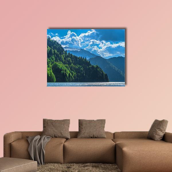Lake Ritsa Mountain Landscape Canvas Wall Art in white, green and blue, single panel hung on a wall